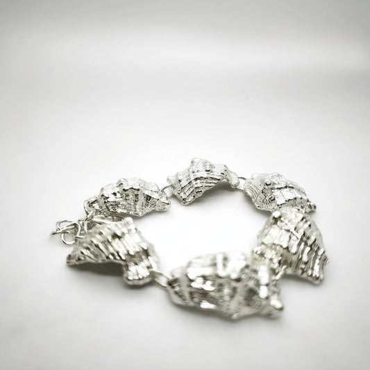 925 sterling silver bracelet with the textures from a conch shell. Design by Inês Almeida