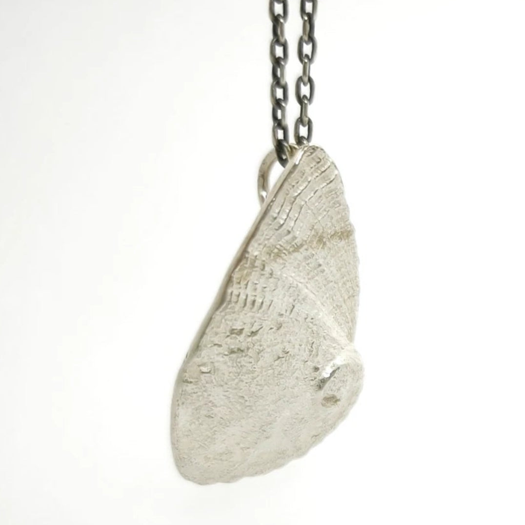 925 sterling silver pendent with the texture from a Fragment of an abalone. Design by Inês Almeida