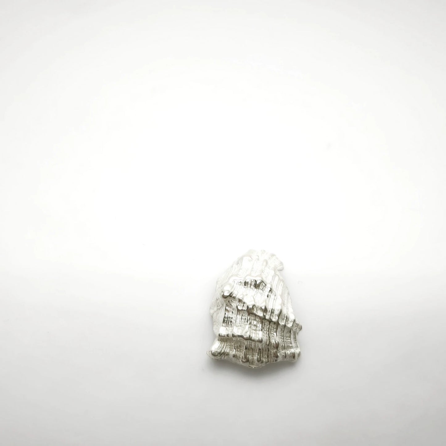 925 sterling silver pendant with the texture from a conch shell. Design by Inês Almeida
