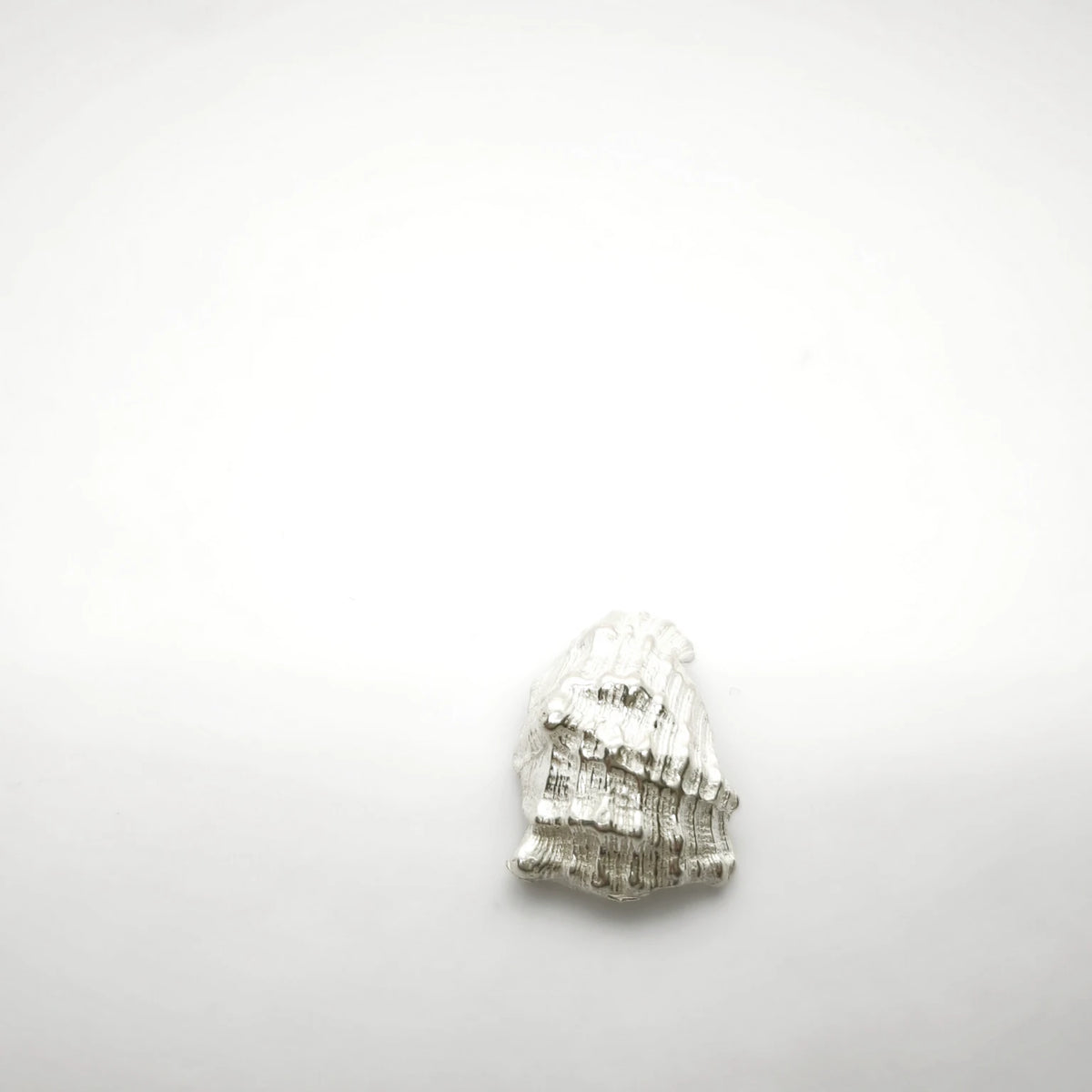 925 sterling silver pendant with the texture from a conch shell. Design by Inês Almeida