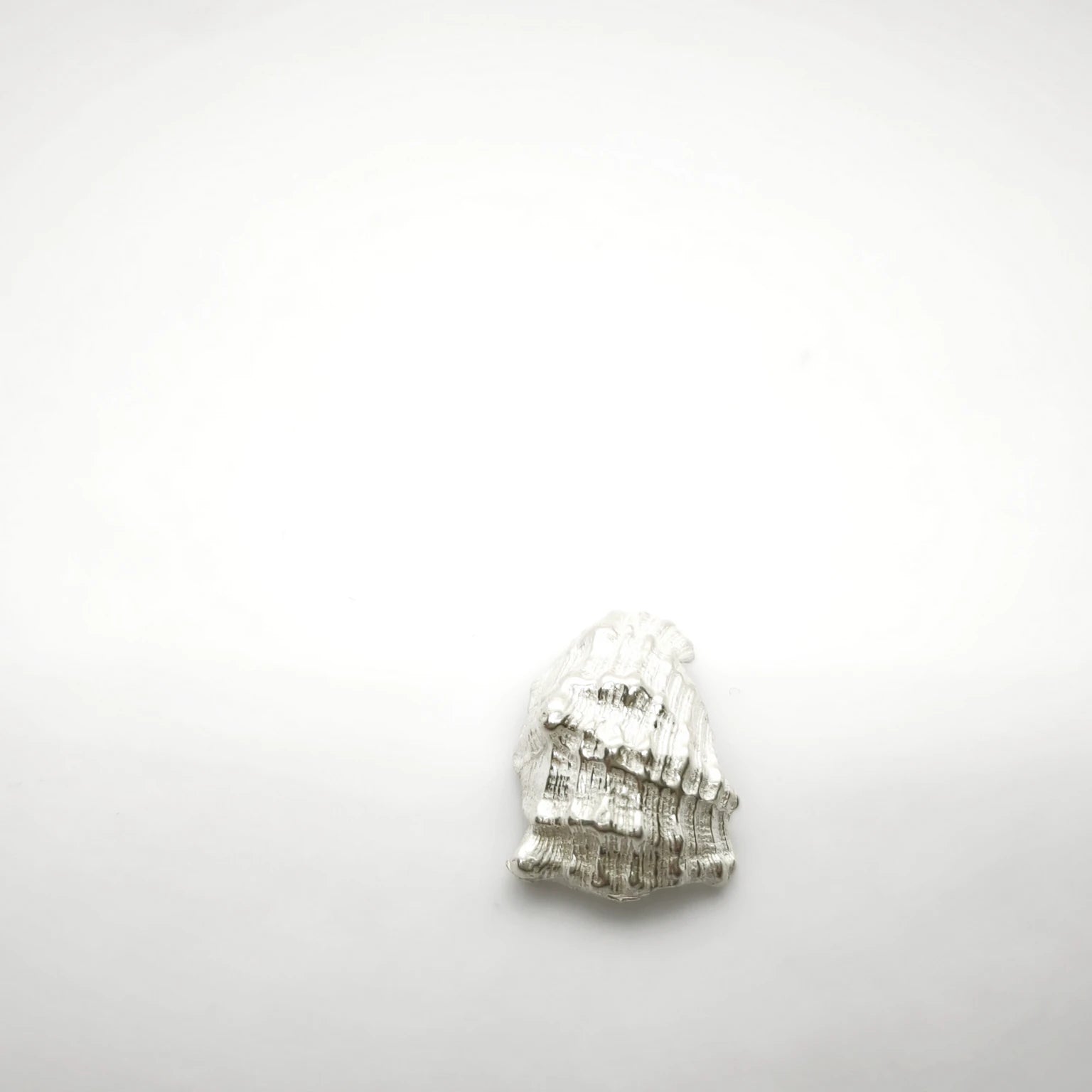 925 sterling silver pendant with the texture from a conch shell. Design by Inês Almeida