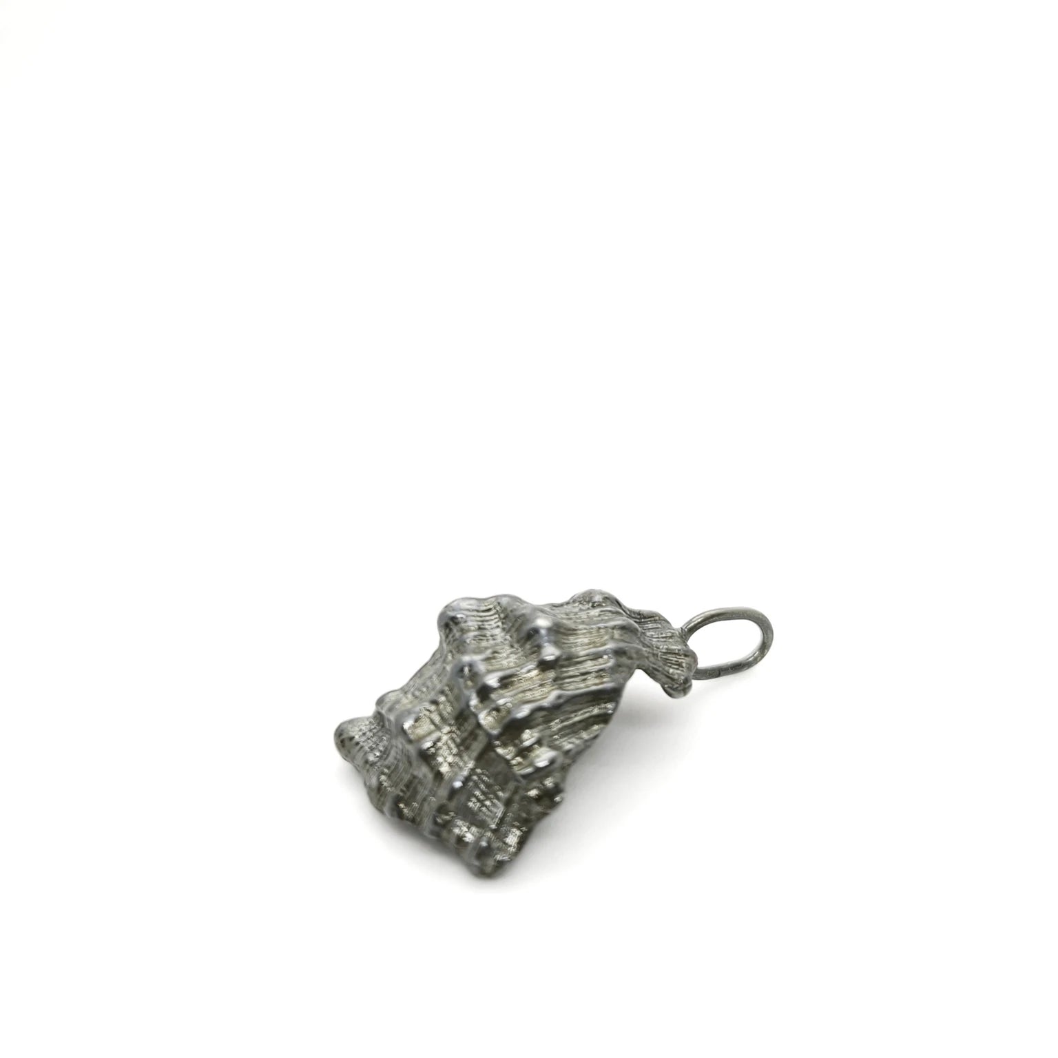 925 sterling silver oxidised pendant with the texture from a conch shell. Design by Inês Almeida