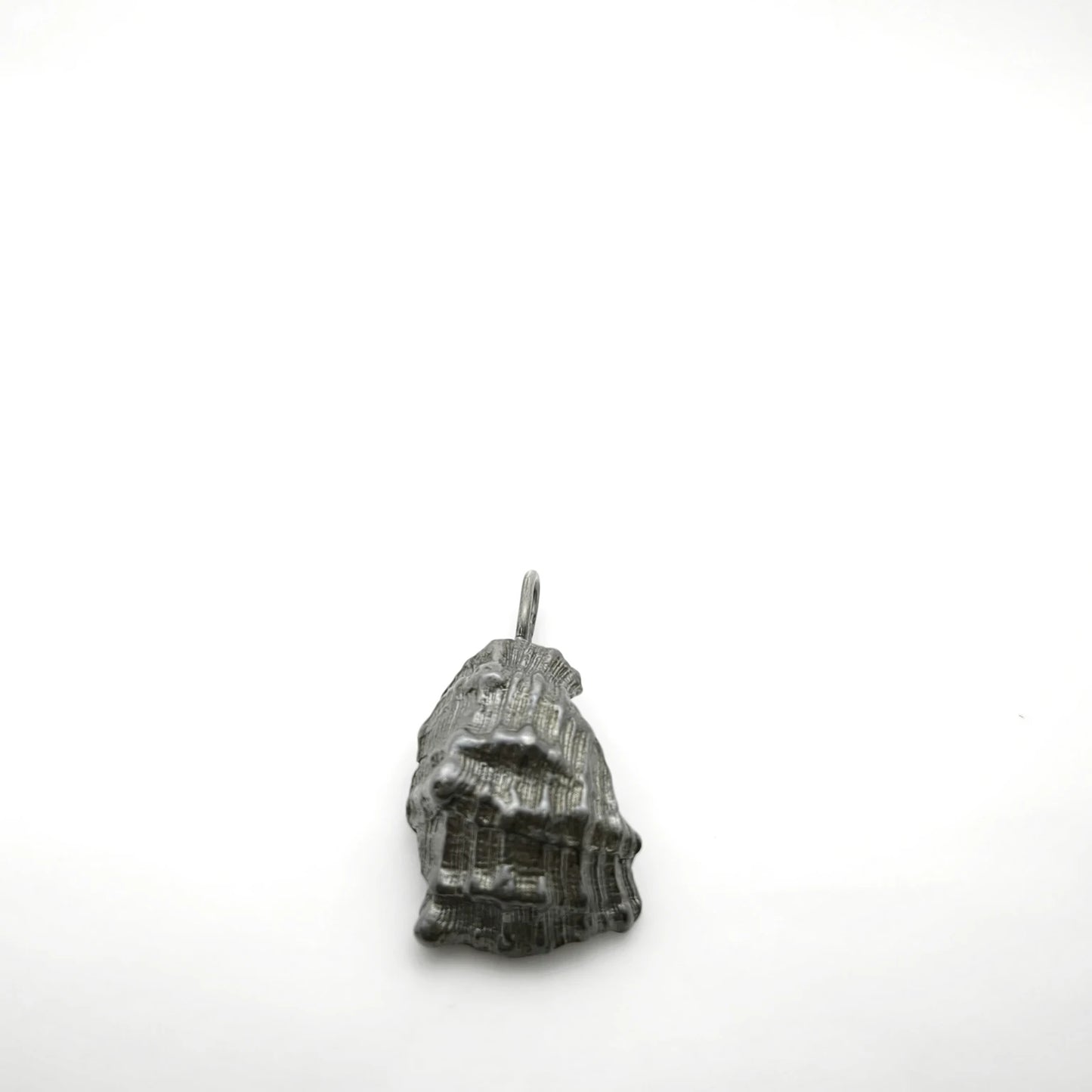 925 sterling silver oxidised pendant with the texture from a conch shell. Design by Inês Almeida