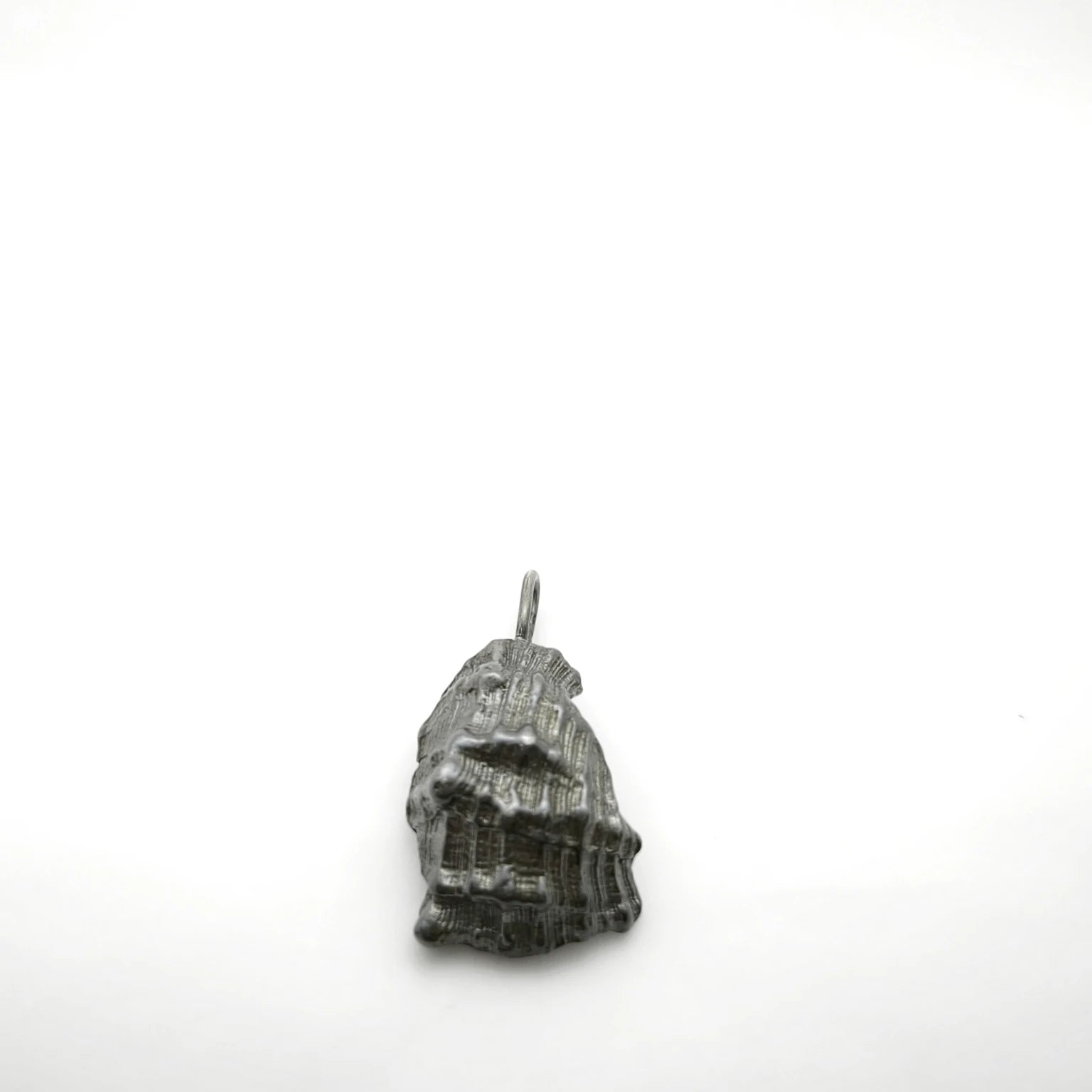 925 sterling silver oxidised pendant with the texture from a conch shell. Design by Inês Almeida