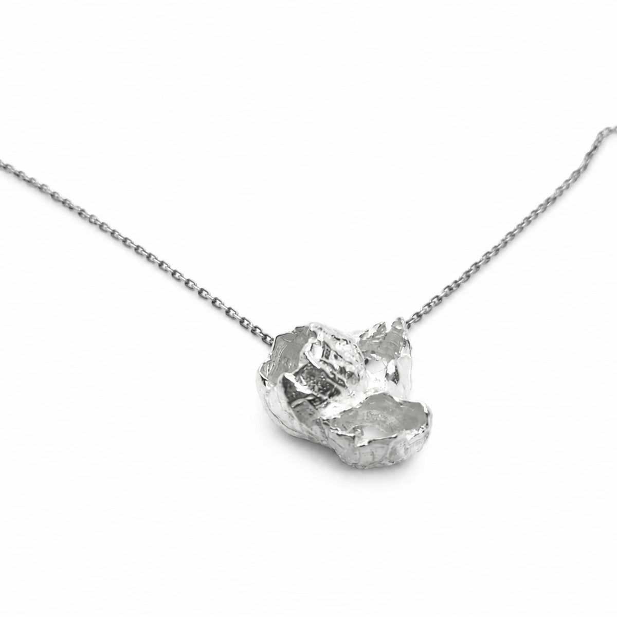 925 sterling silver pendant with the texture from barnacles in a jewellery black box. Design by Inês Almeida