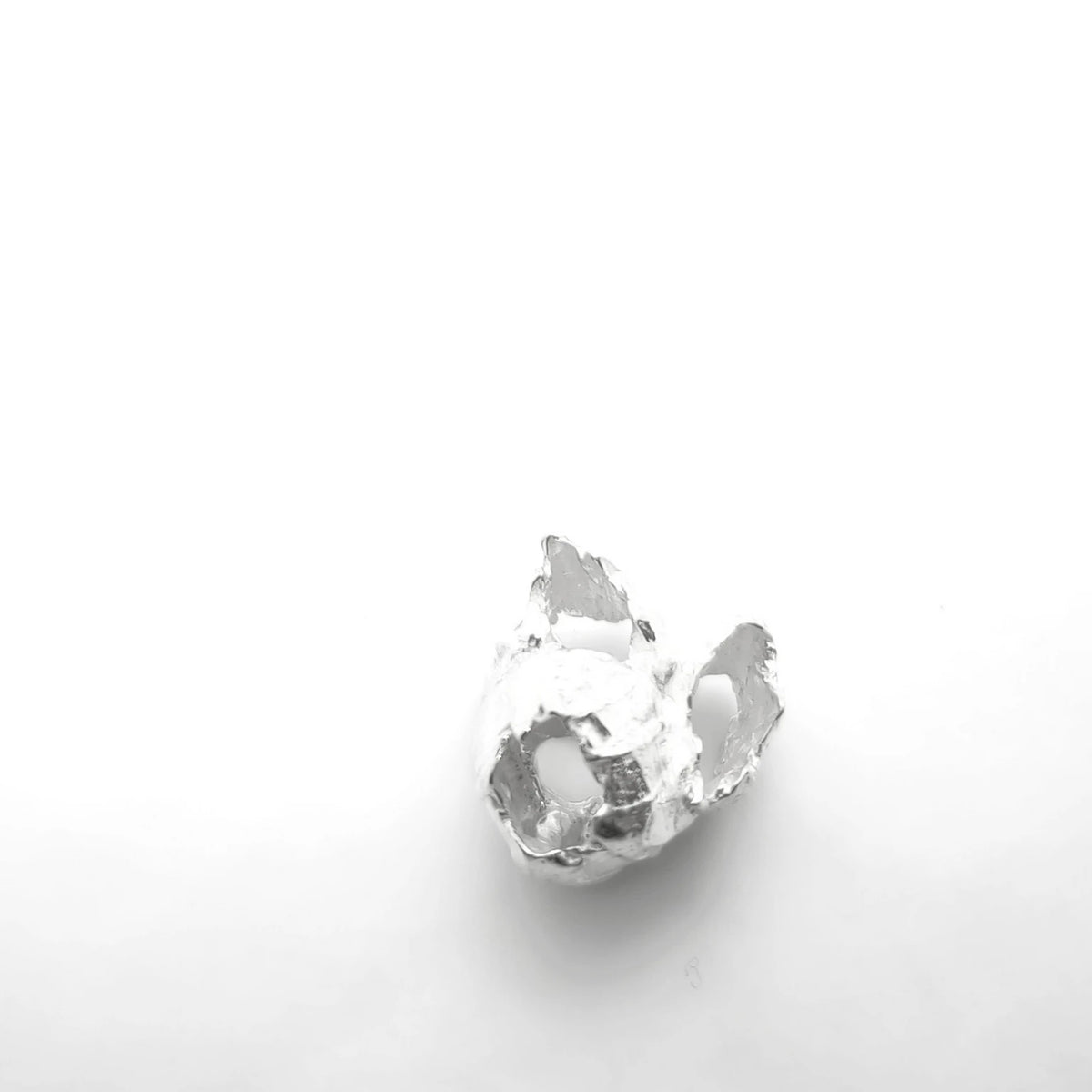 925 sterling silver pendant with the texture from barnacles in a jewellery black box. Design by Inês Almeida