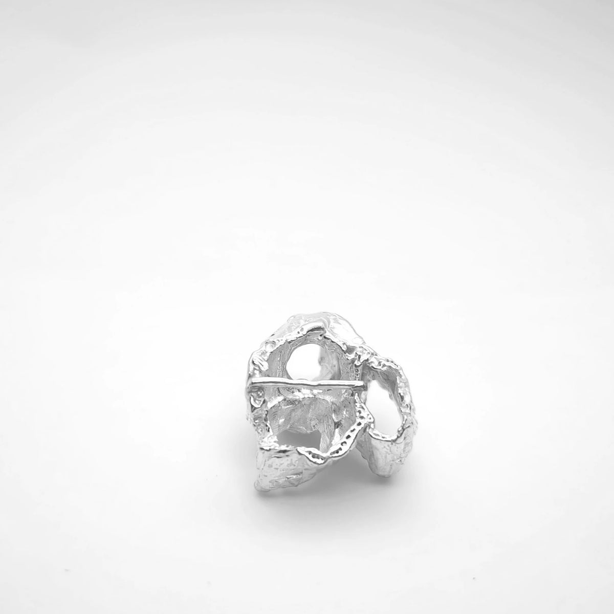 925 sterling silver pendant with the texture from barnacles in a jewellery black box. Design by Inês Almeida