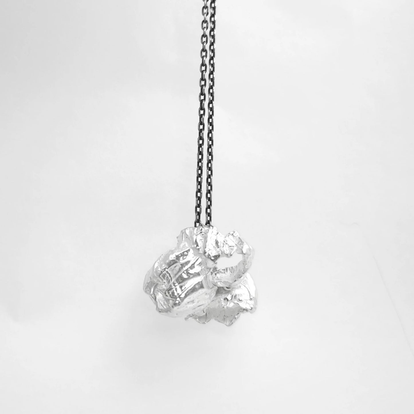 925 sterling silver pendant with the texture from barnacles in. Design by Inês Almeida