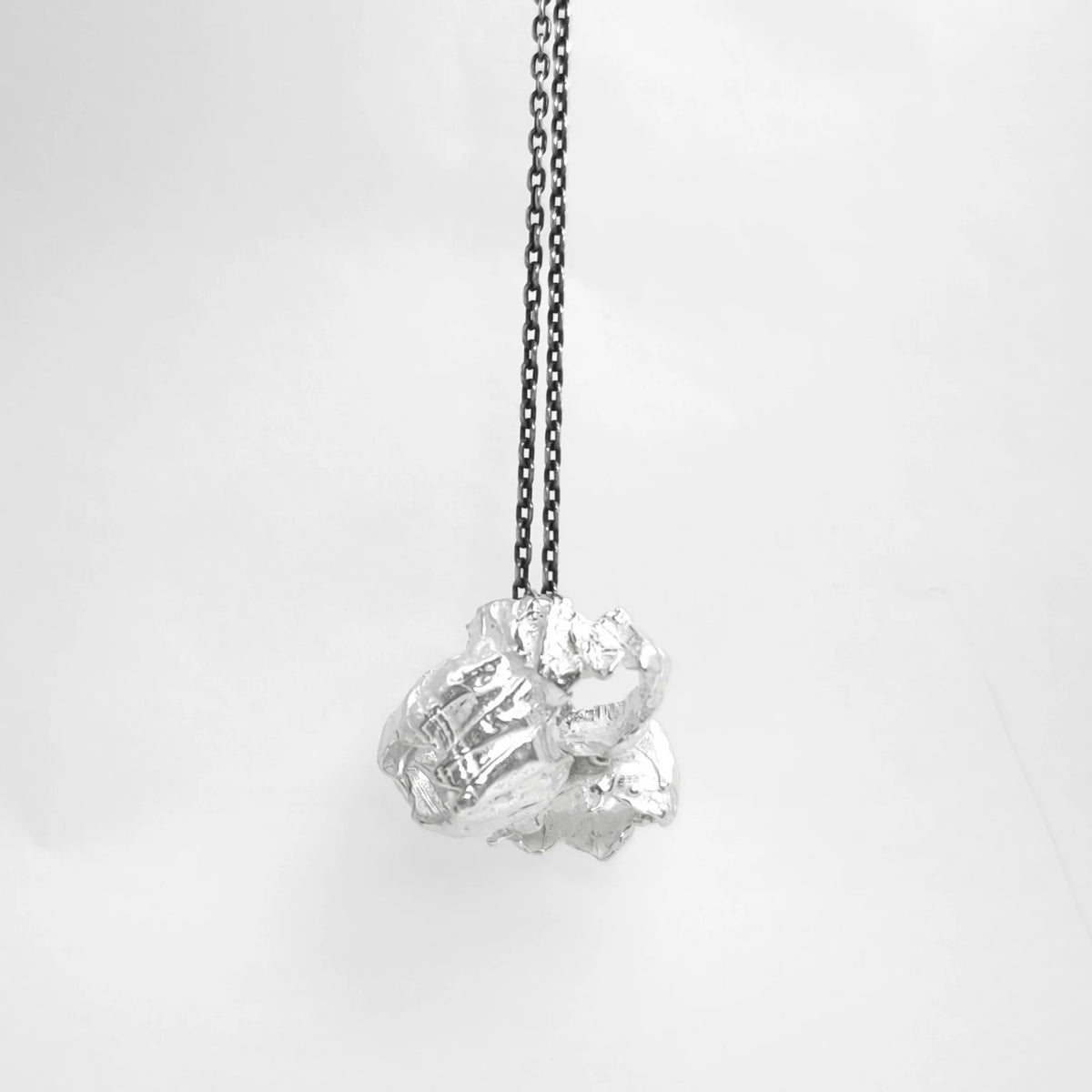 925 sterling silver pendant with the texture from barnacles in. Design by Inês Almeida