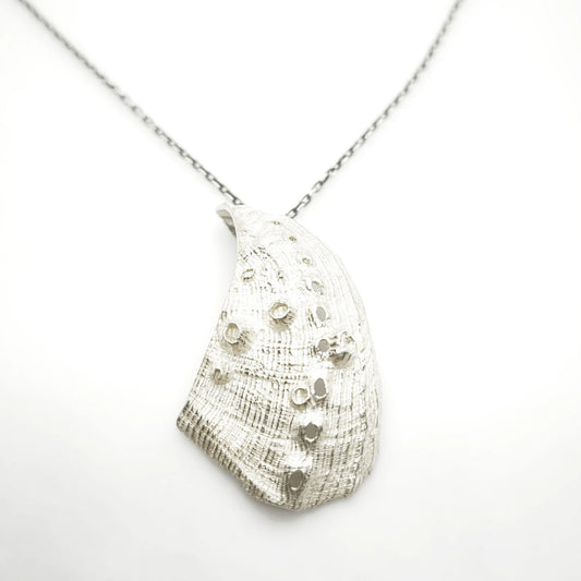 925 sterling silver pendent with the texture from a Fragment of an abalone. Design by Inês Almeida
