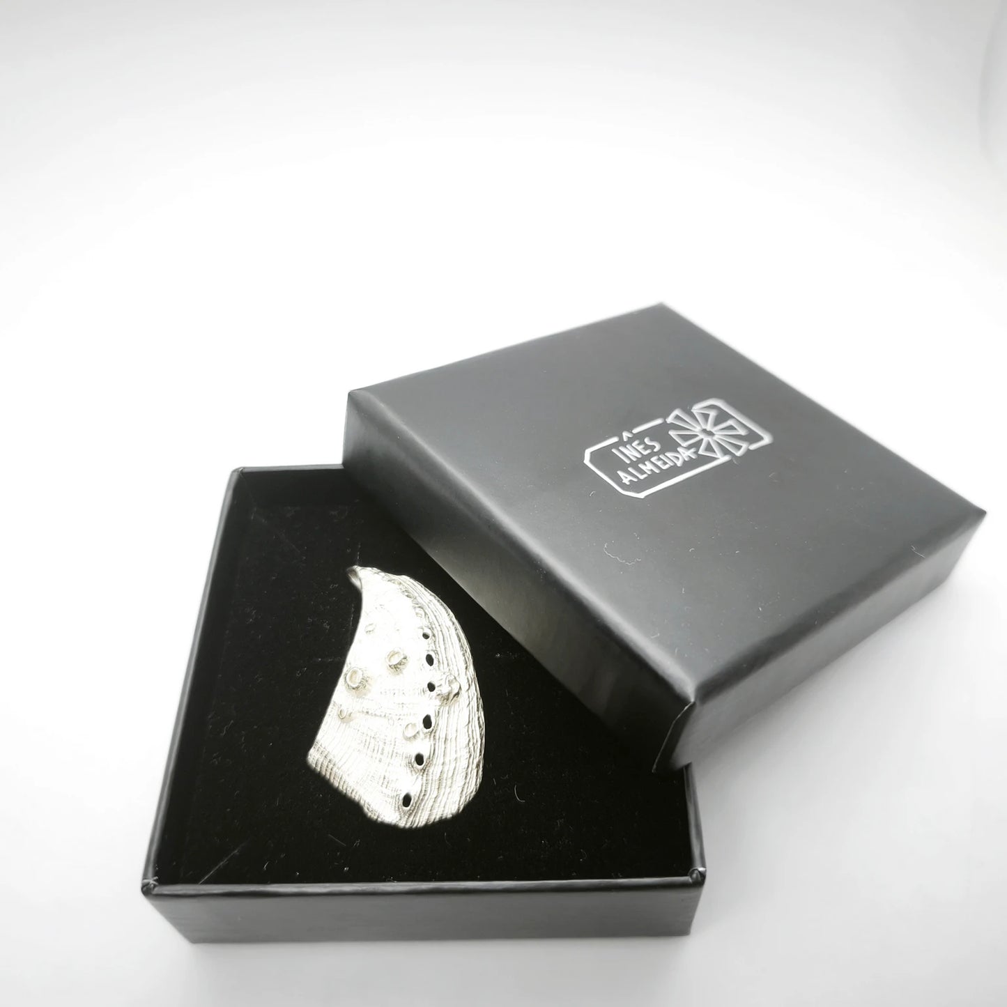 925 sterling silver pendent with the texture from a Fragment of an abalone in a j. Design by Inês Almeidawellery black box