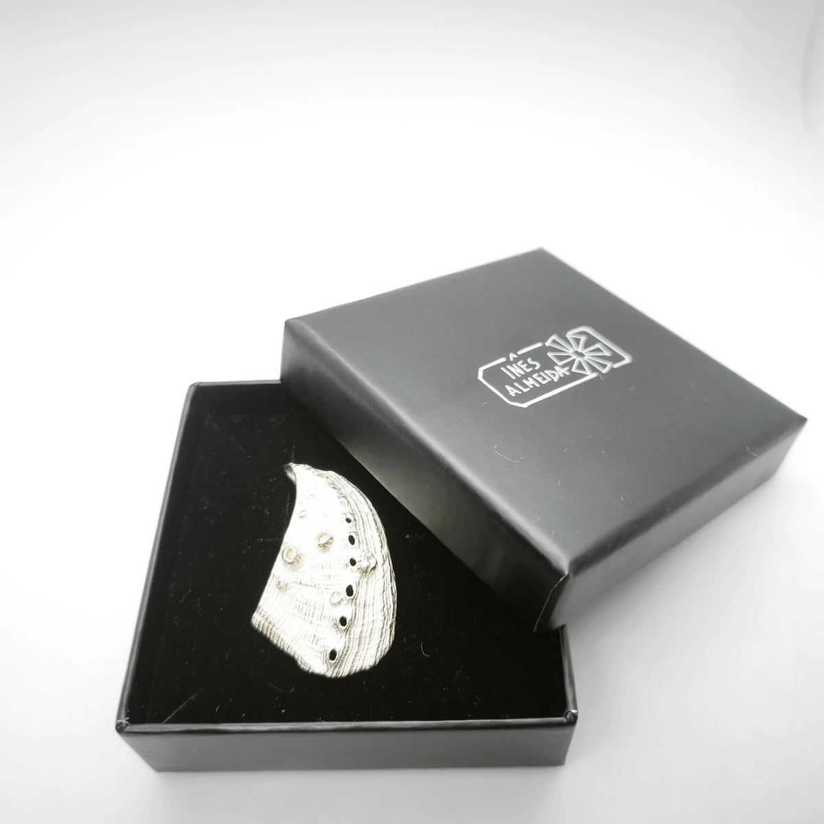 925 sterling silver pendent with the texture from a Fragment of an abalone in a j. Design by Inês Almeidawellery black box
