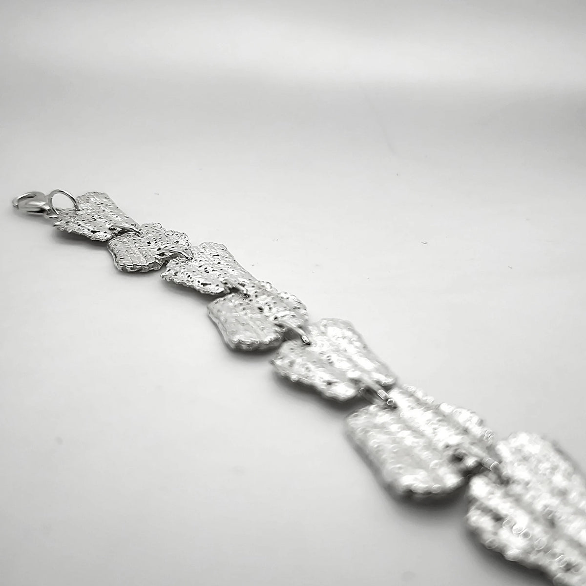 925 sterling silver bracelet with the textures from shell fragments. Design by Inês Almeida