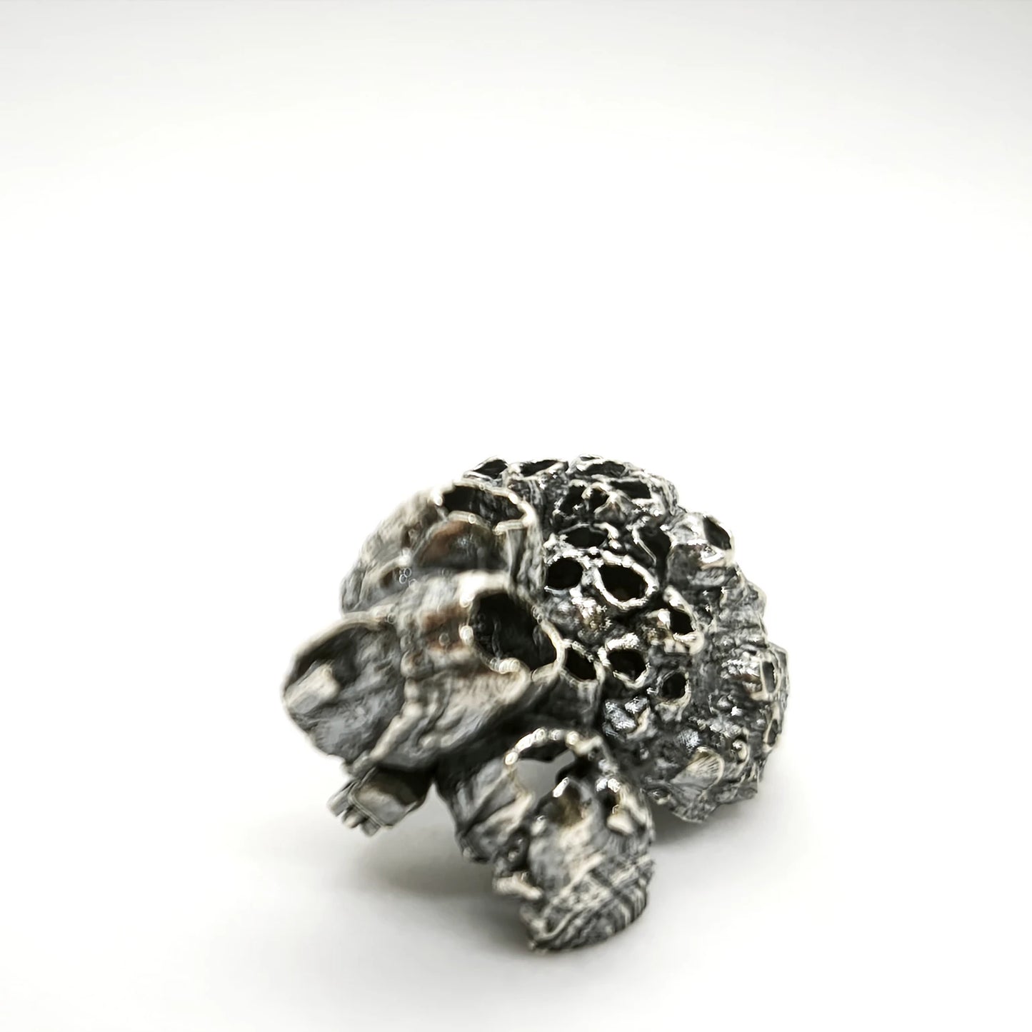 925 sterling oxidised silver brooch with the texture from a barnacle. Design by Inês Almeida