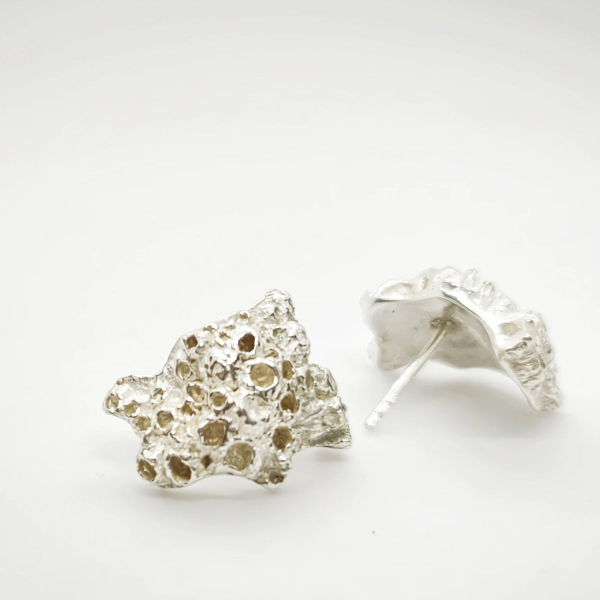 925 sterling silver earrings with the texture from a coraline. Design by Inês Almeida