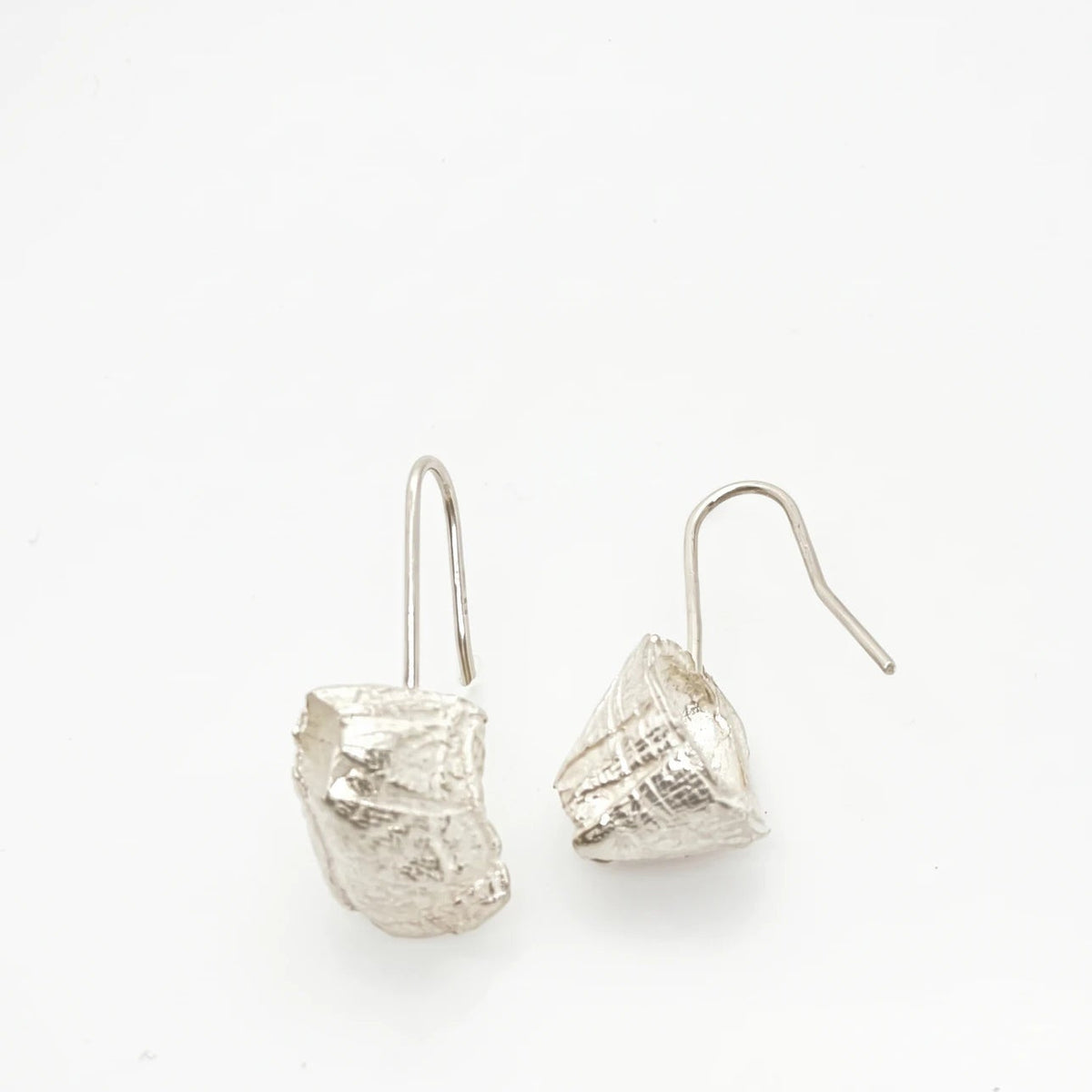 925 sterling silver earrings with the texture from a barnacle. Design by Inês Almeida