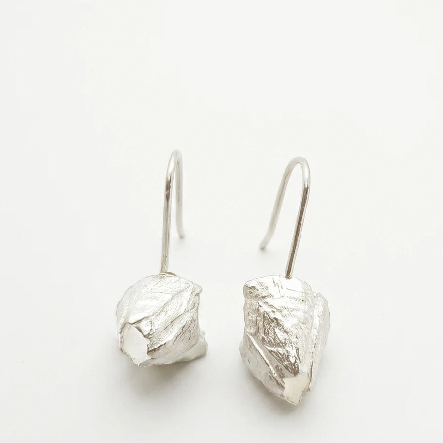 925 sterling silver earrings with the texture from a barnacle. Design by Inês Almeida