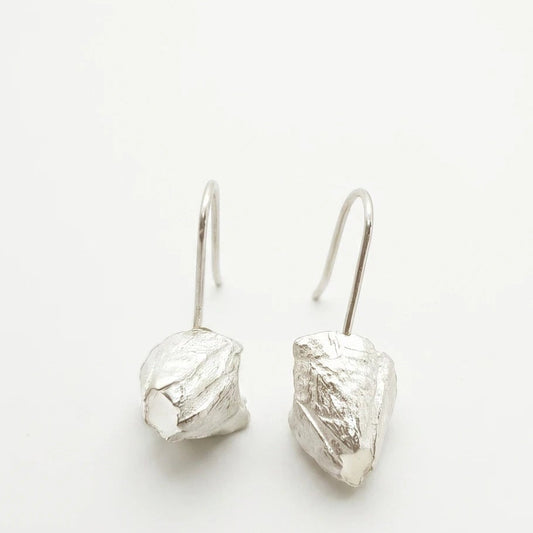 925 sterling silver earrings with the texture from a barnacle. Design by Inês Almeida