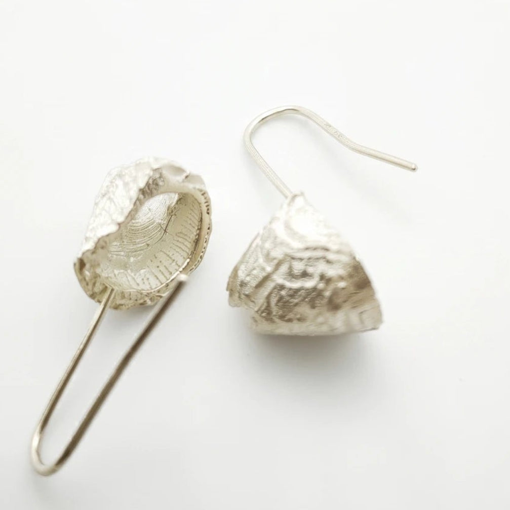 925 sterling silver earrings with the texture from a barnacle. Design by Inês Almeida
