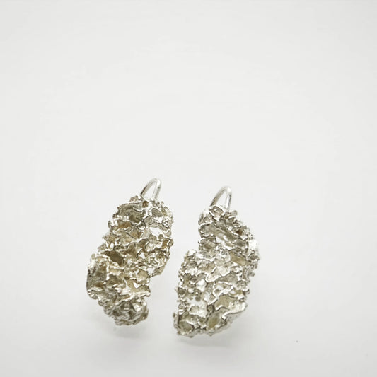 925 sterling silver earrings with the texture from a coraline. Design by Inês Almeida