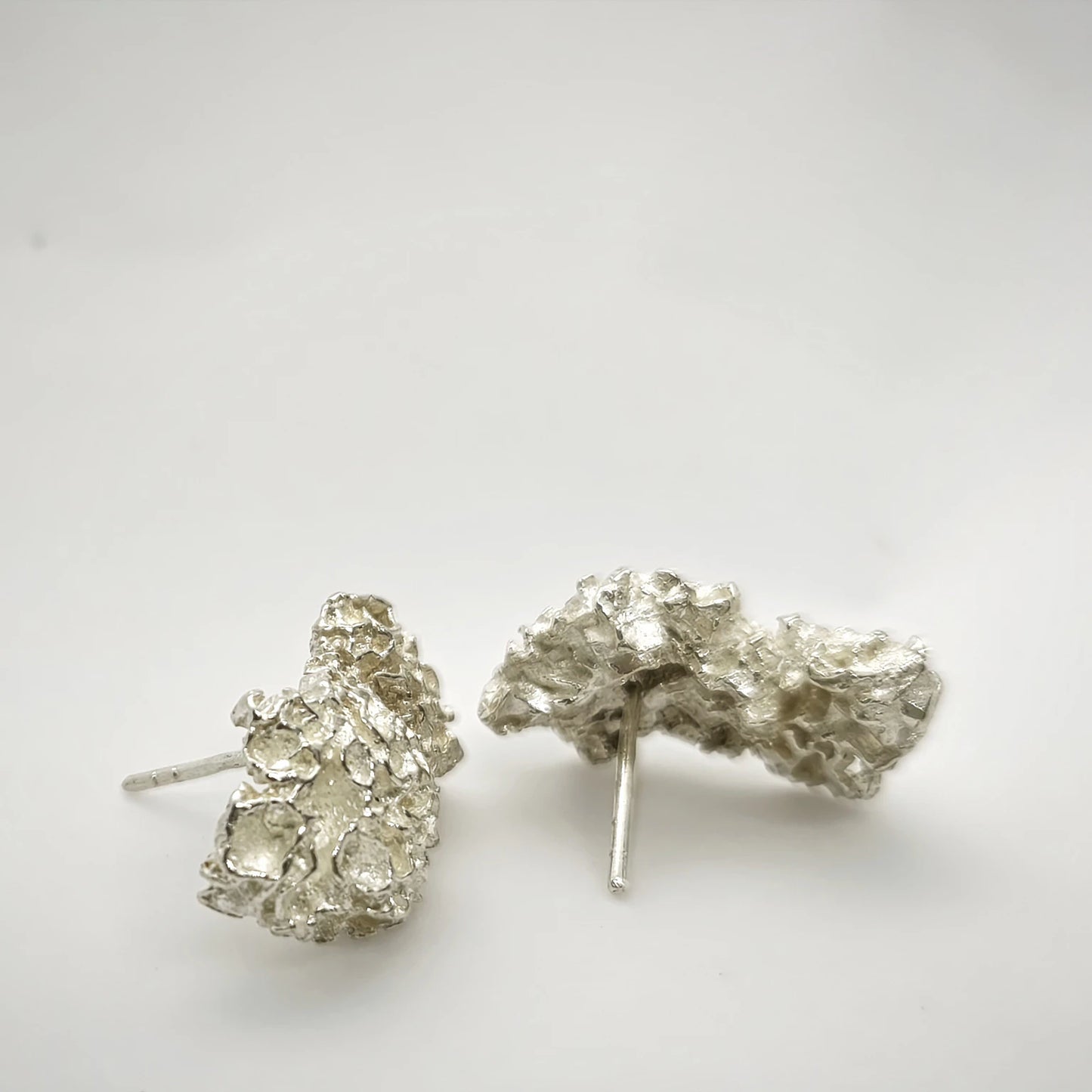 925 sterling silver earrings with the texture from a coraline. Design by Inês Almeida