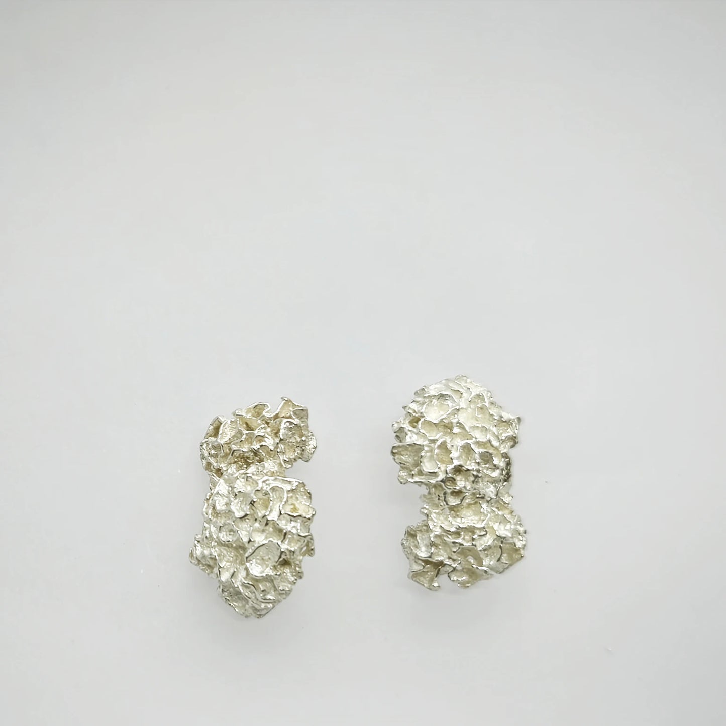 925 sterling silver earrings with the texture from a coraline. Design by Inês Almeida