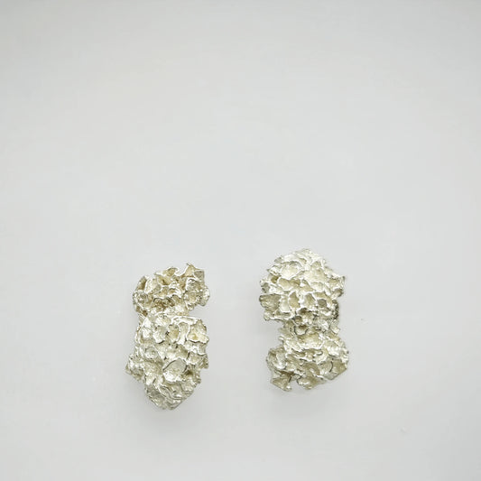 925 sterling silver earrings with the texture from a coraline. Design by Inês Almeida