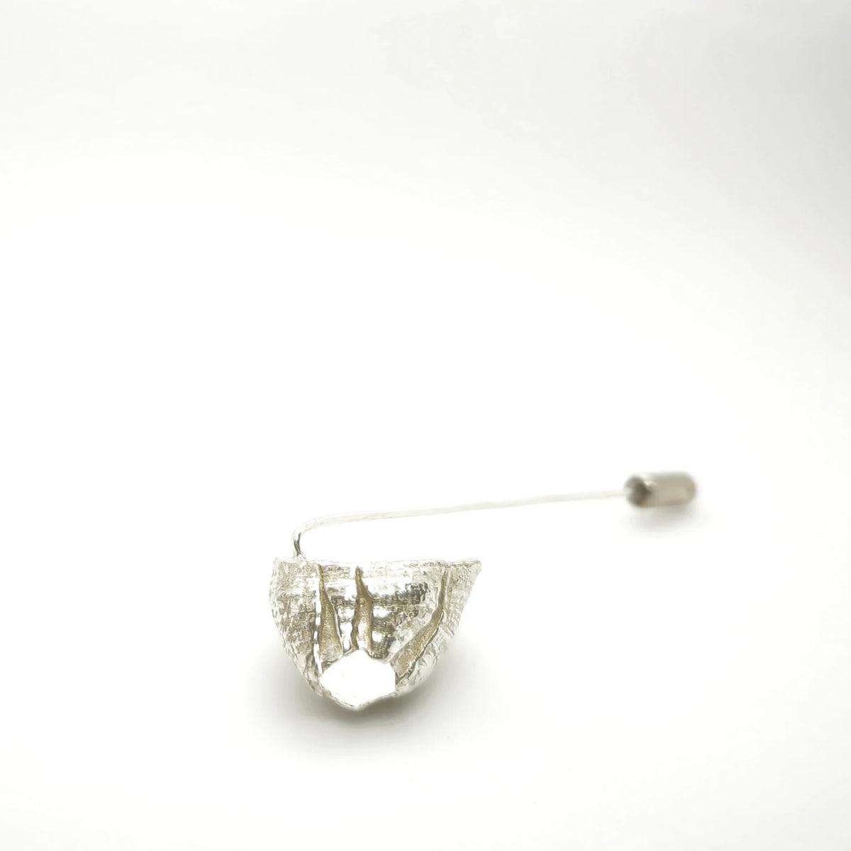 925 sterling silver pin with the texture from a barnacle. Design by Inês Almeida