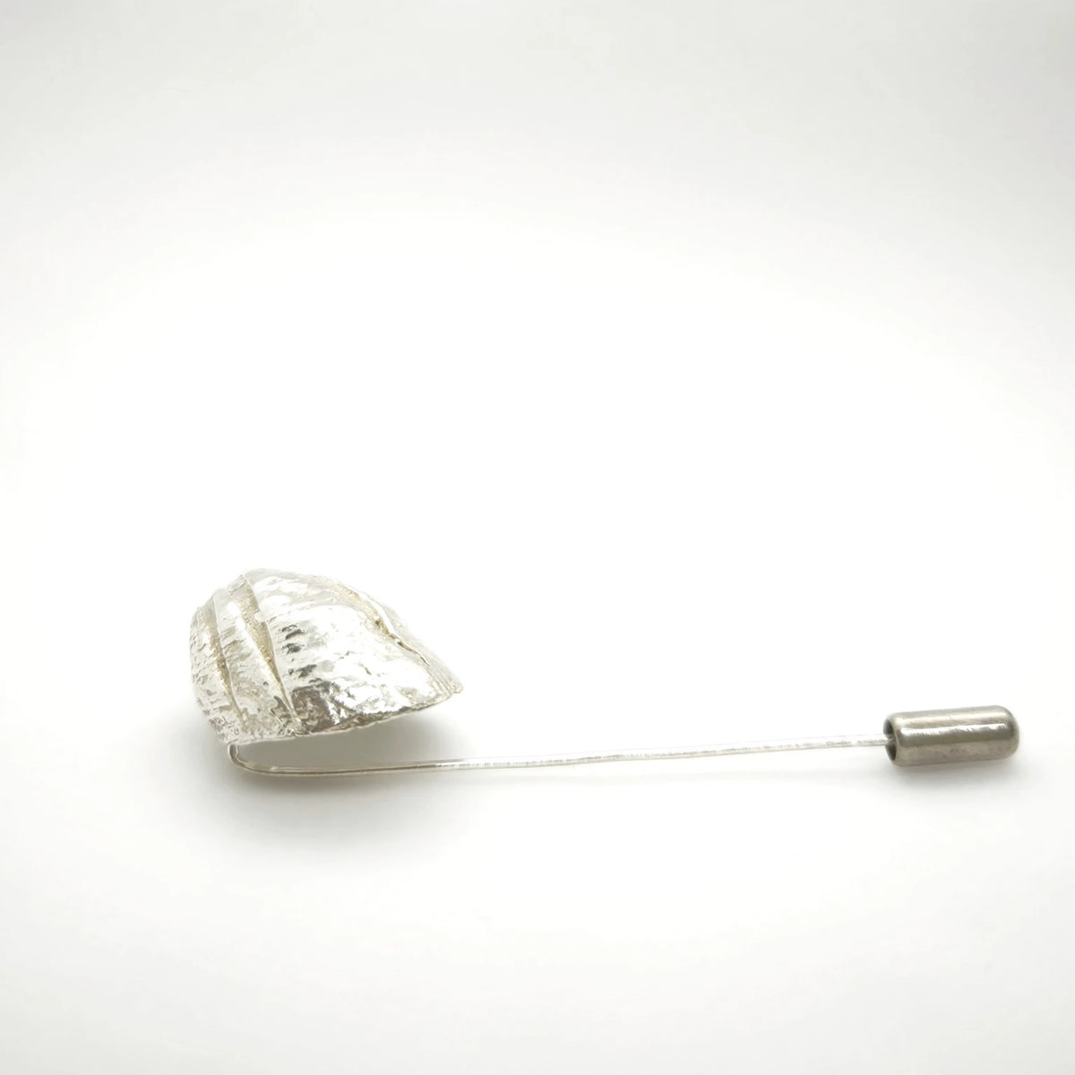 925 sterling silver pin with the texture from a barnacle. Design by Inês Almeida