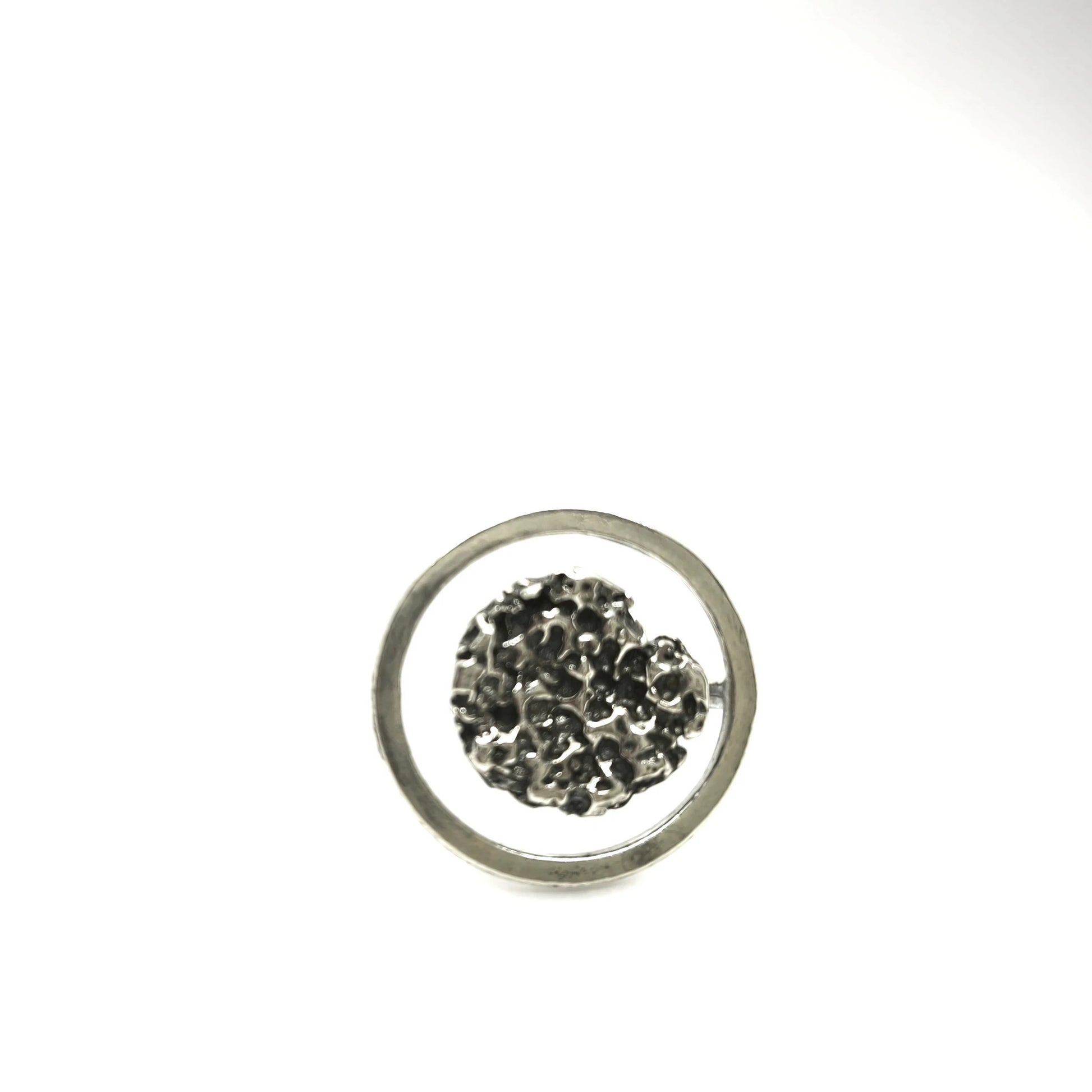 925 sterling silver ring oxidised with the texture from a conch shell. Design by Inês Almeida