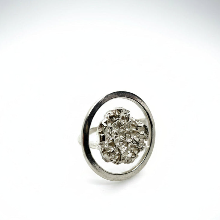 925 sterling silver ring with the texture from a rock fragment. Design by Inês Almeida