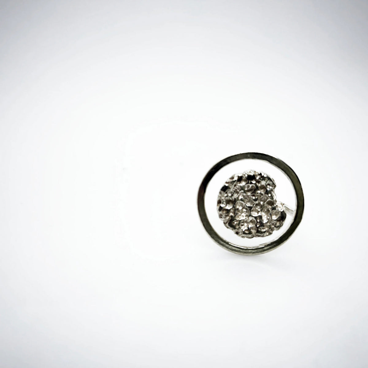 925 sterling silver ring with the texture from a rock fragment. Design by Inês Almeida