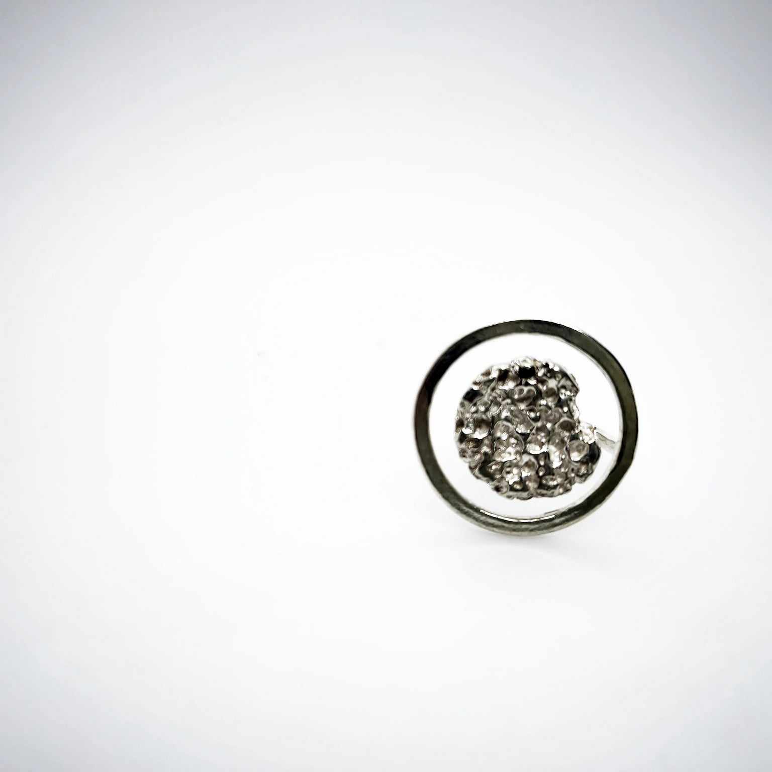 925 sterling silver ring with the texture from a rock fragment. Design by Inês Almeida