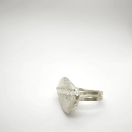 925 sterling silver ring with the texture from a pebble. Design by Inês Almeida
