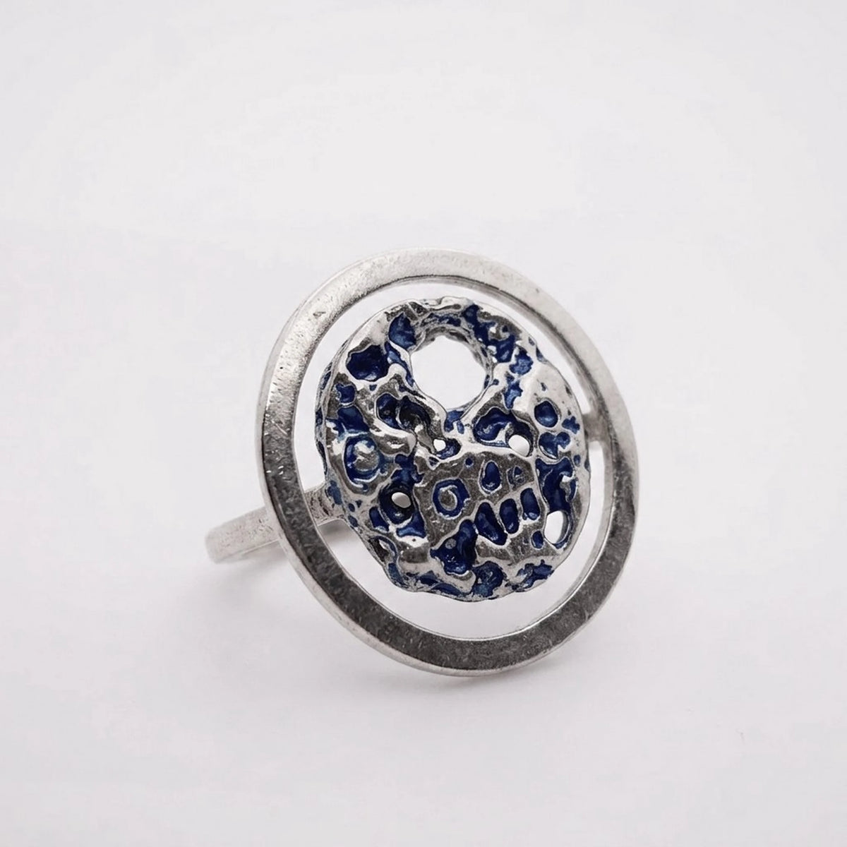 925 sterling silver blue ring with the texture from a conch. Design by Inês Almeida