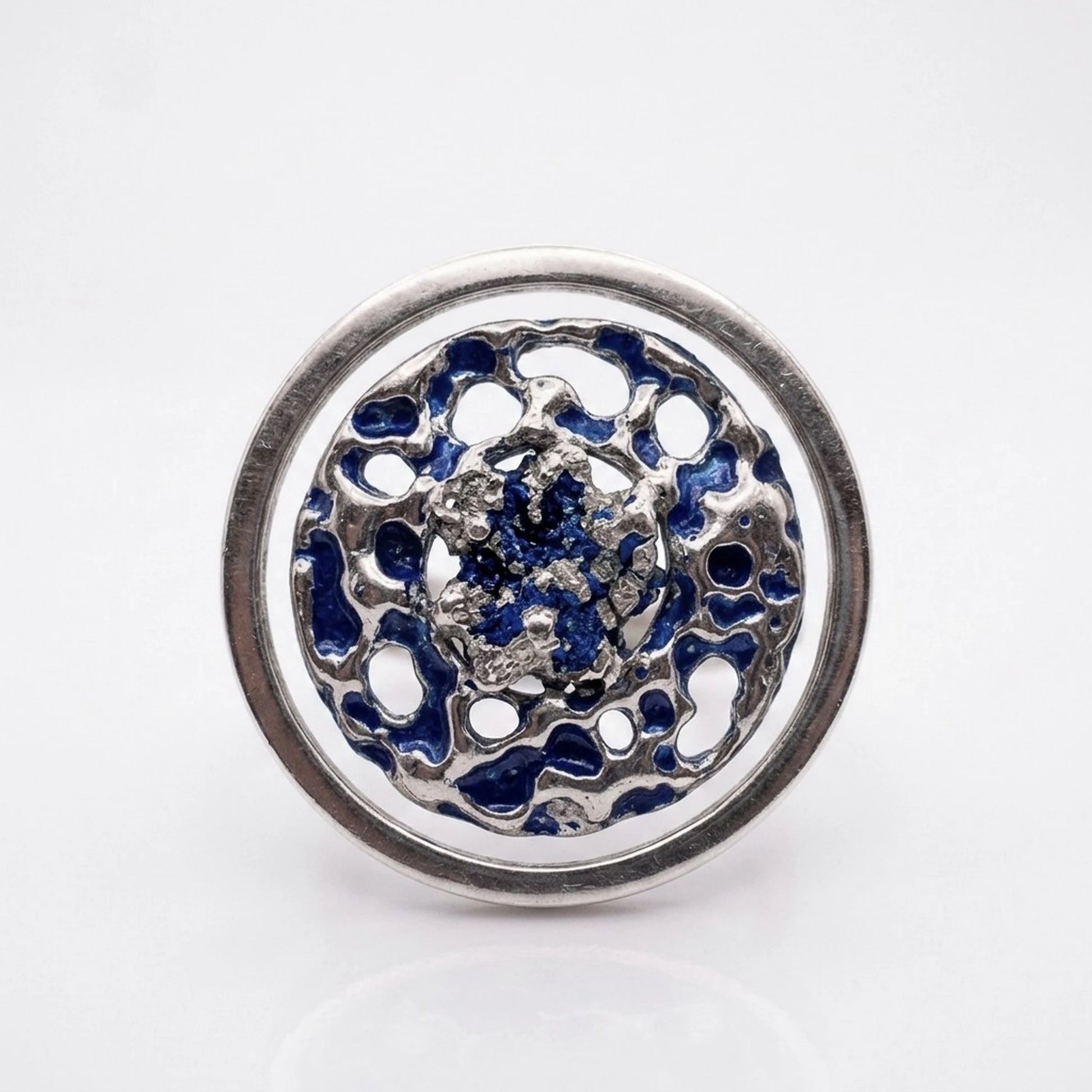 925 sterling silver blue ring with the texture from a conch. Design by Inês Almeida