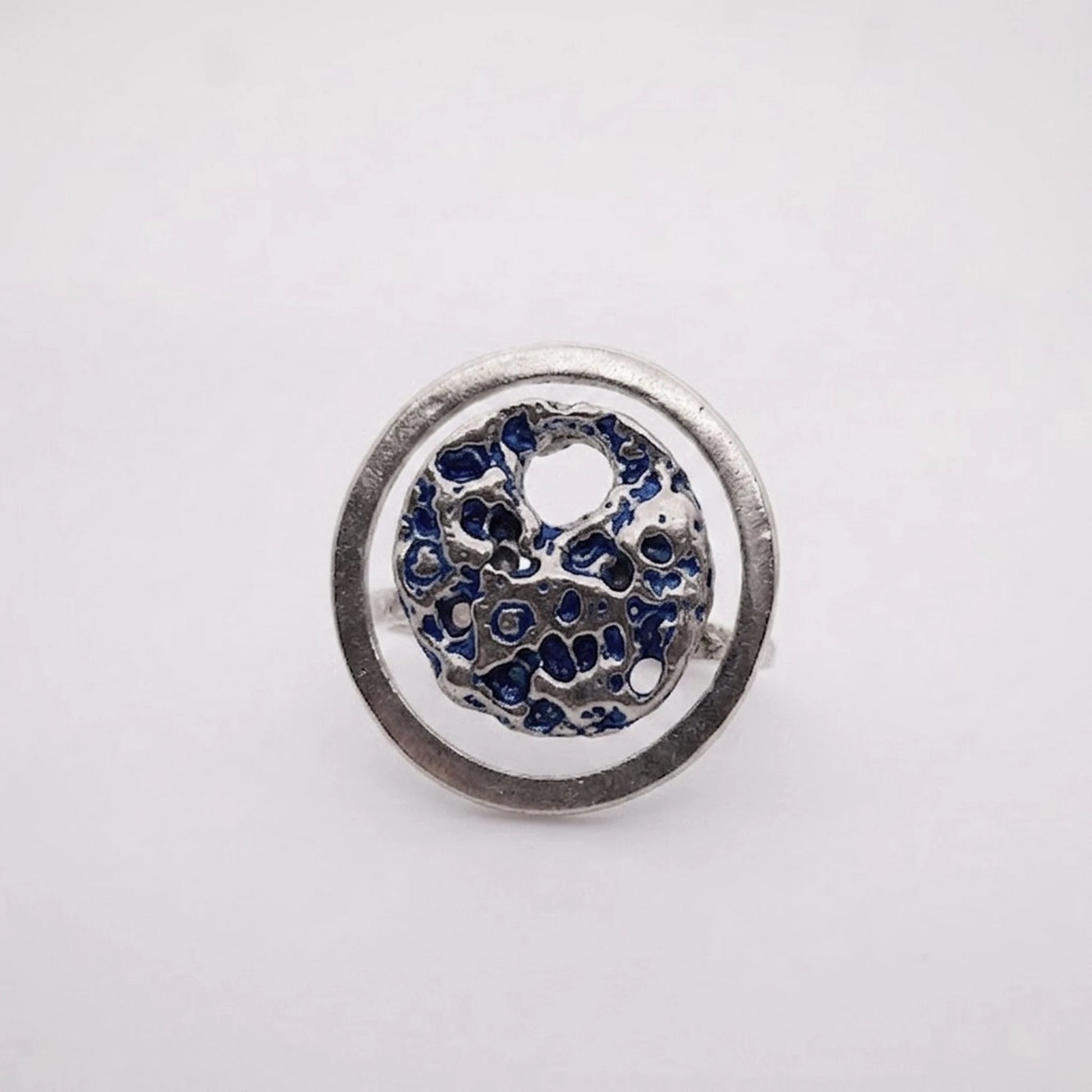 925 sterling silver blue ring with the texture from a conch. Design by Inês Almeida