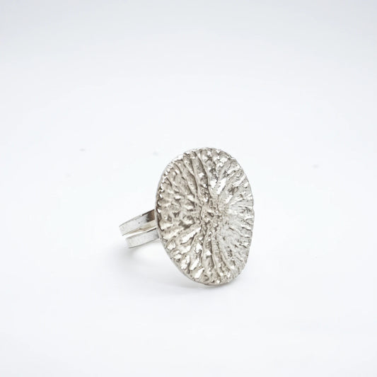 925 sterling silver ring with the texture from a dolphin bone. Design by Inês Almeida