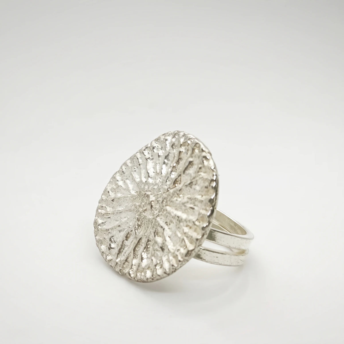 925 sterling silver ring with the texture from a dolphin bone. Design by Inês Almeida