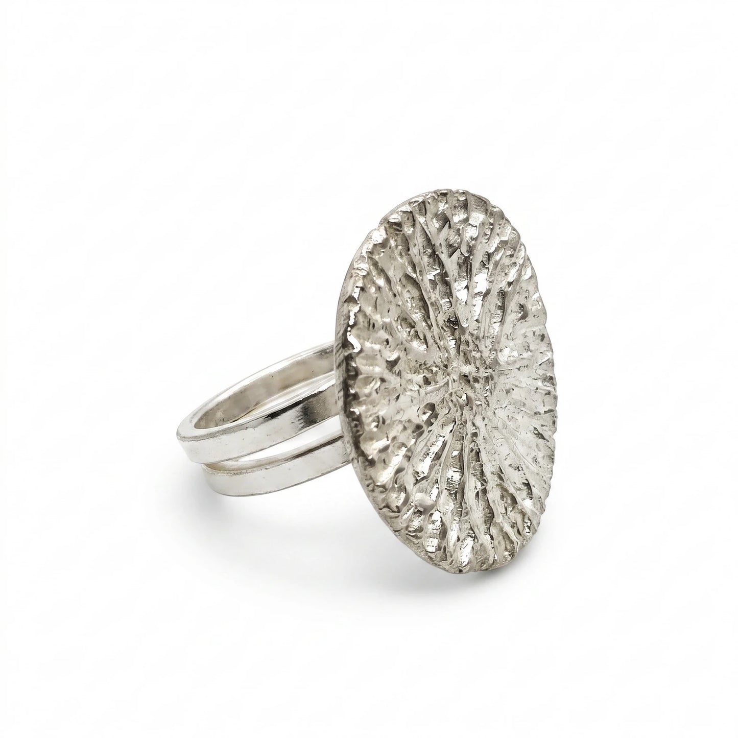 925 sterling silver ring with the texture from a dolphin bone. Design by Inês Almeida