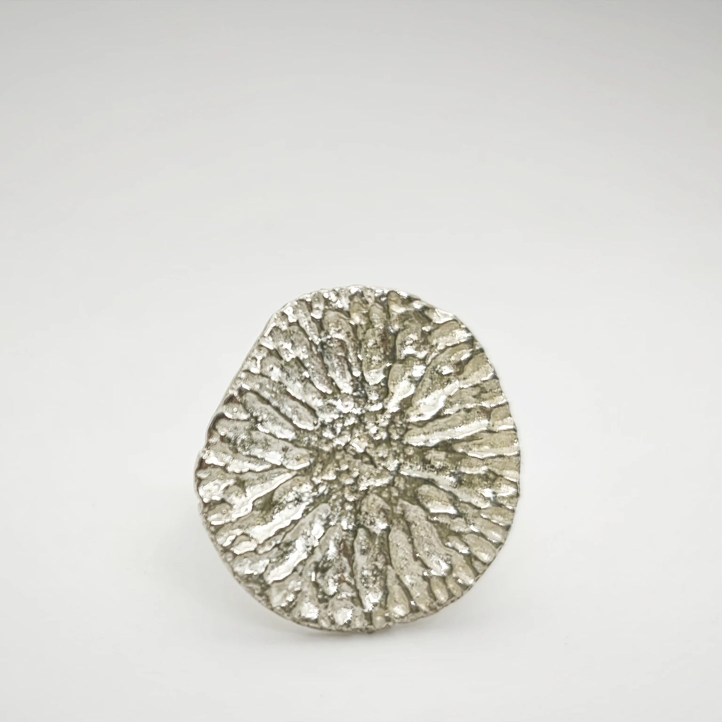 925 sterling silver ring with the texture from a dolphin bone. Design by Inês Almeida