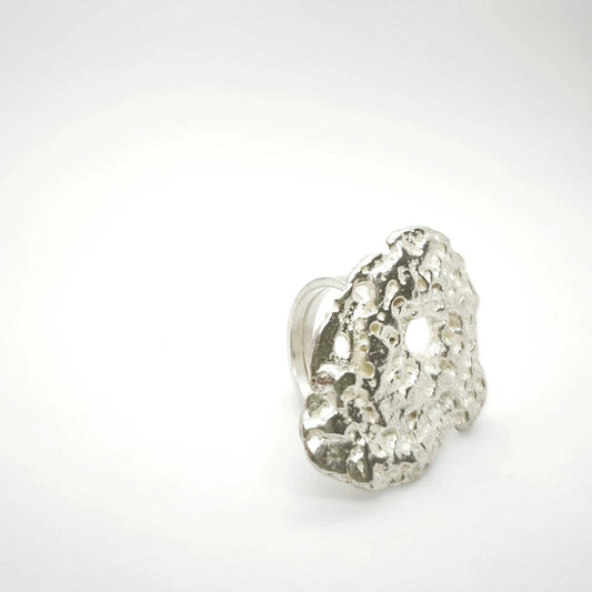 925 sterling silver ring with the texture from pebble. Design by Inês Almeida