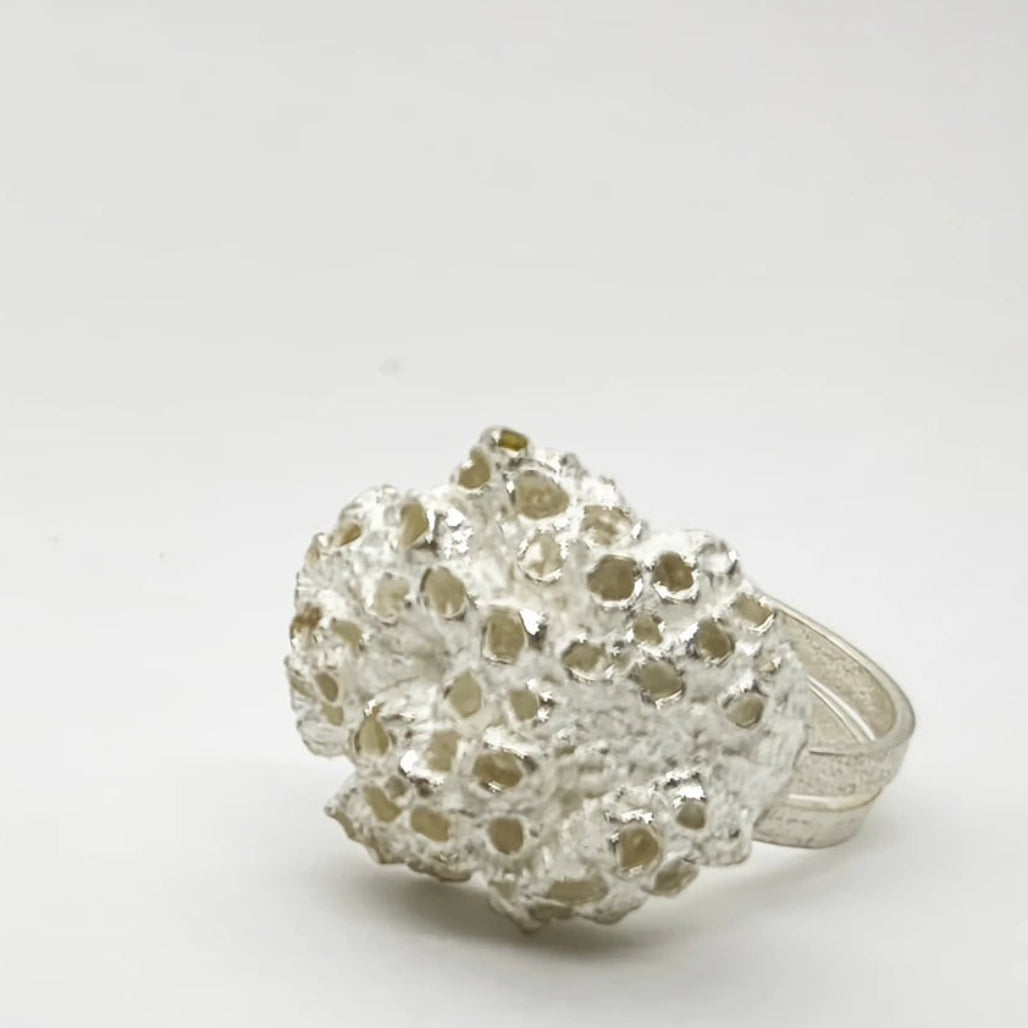 925 sterling silver ring with the texture from small barnacles. Design by Inês Almeida