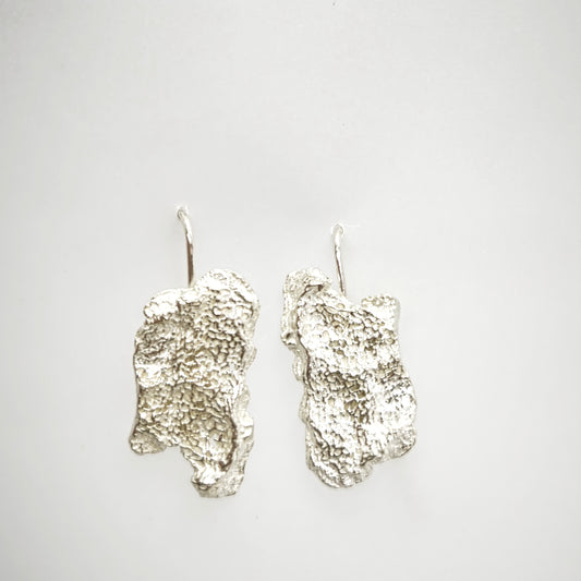925 sterling silver earrings with the texture from an algae. Design by Inês Almeida