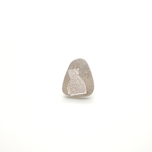 Sterling silver earring featuring a bottle motif, front view, by Inês Almeida.