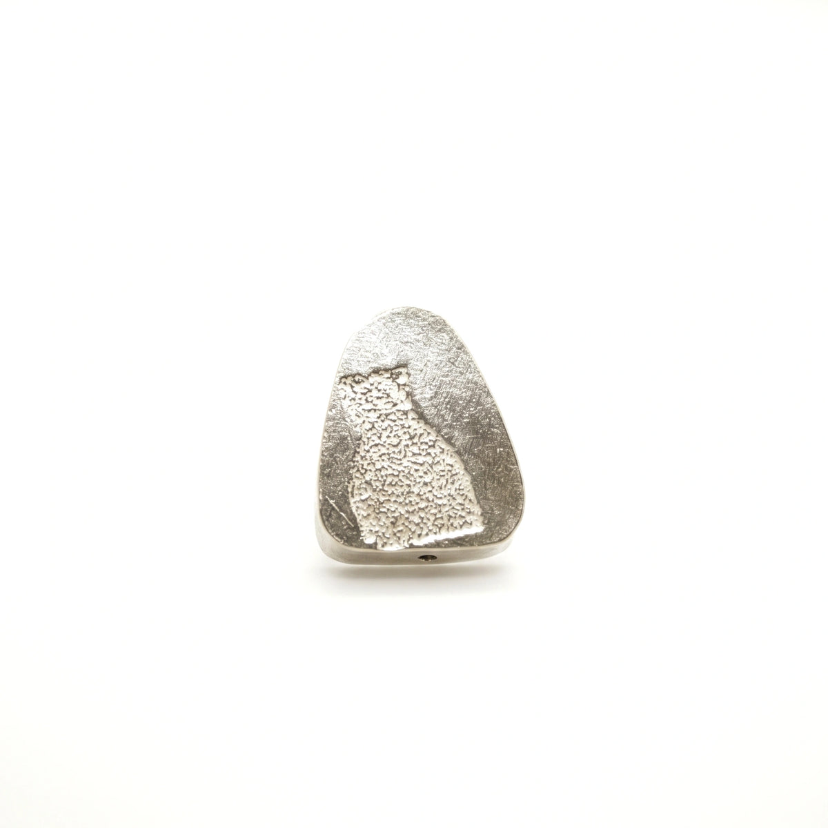 Sterling silver earring featuring a bottle motif, front view, by Inês Almeida.