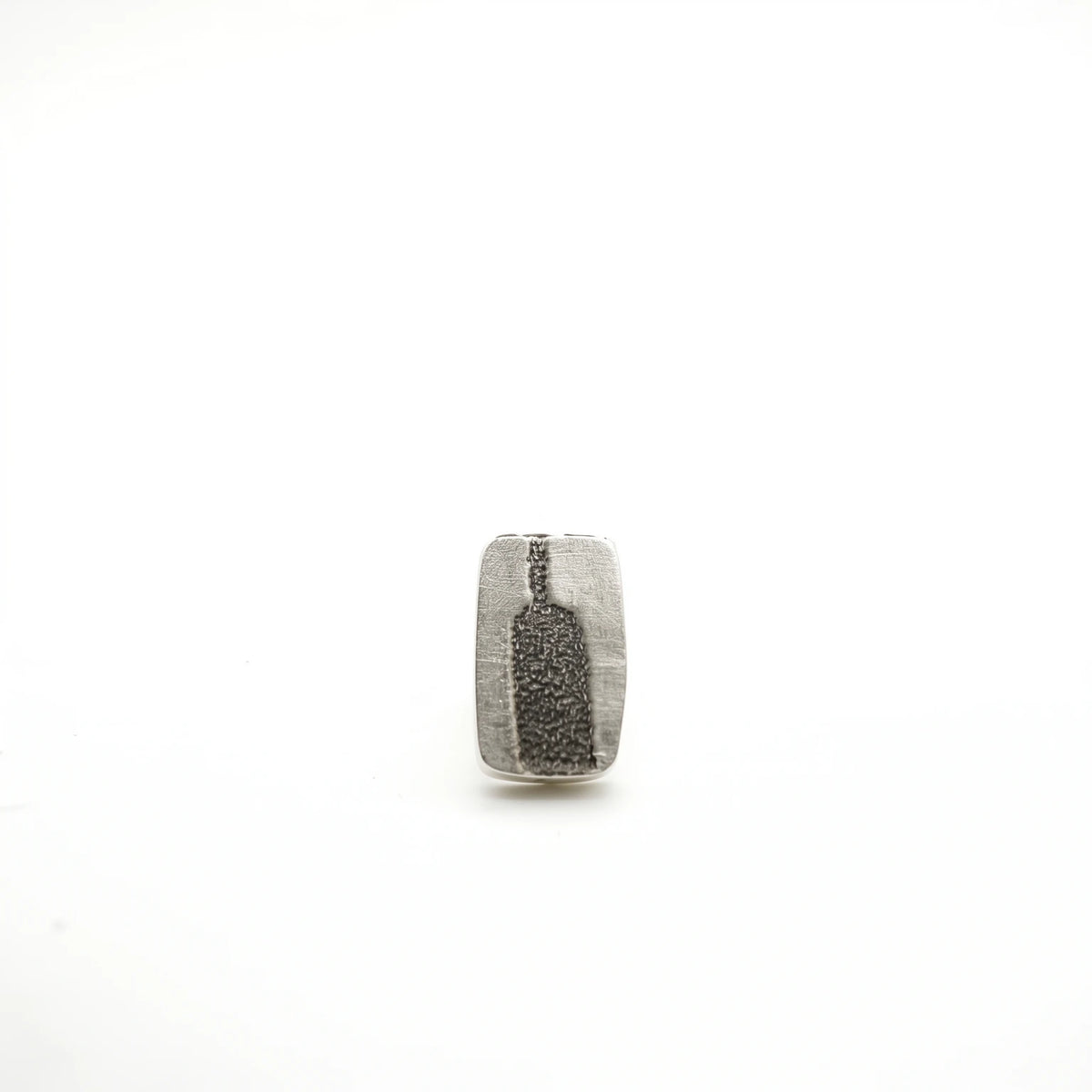 Sterling silver earrings featuring a bottle motif, front view, by Inês Almeida.