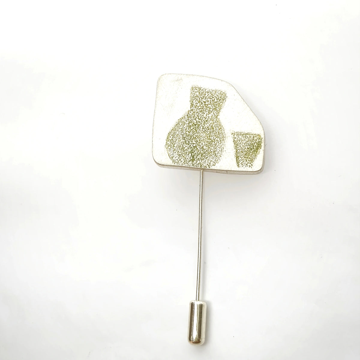 Sterling silver pin featuring a green jug and glass motif, front view.