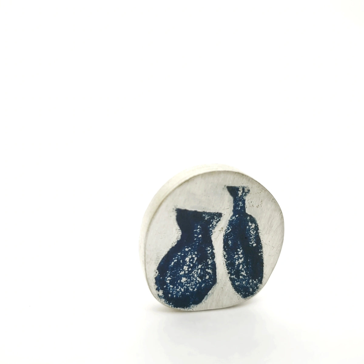Sterling silver pin featuring two blue Morandi-inspired jug motifs, front view.